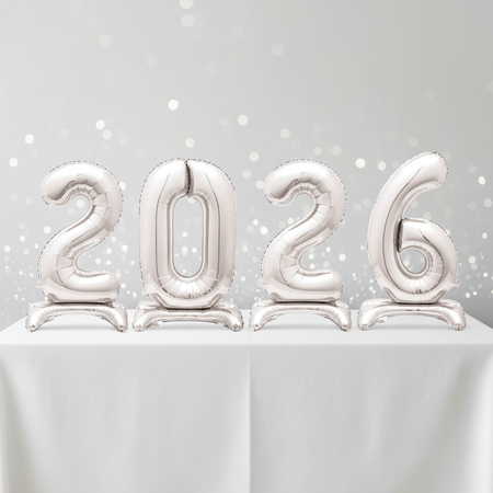 2026 Silver Standing Balloons on White Tablecloth with Silver Glitz Background