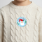 3.7cm “I Visited Santa” sticker on a child’s top