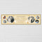 A personalized horizontal banner for a 50th wedding anniversary, featuring circular photo frames, gold script text, and small gold hearts on a cream background, mounted on a white brick wall.