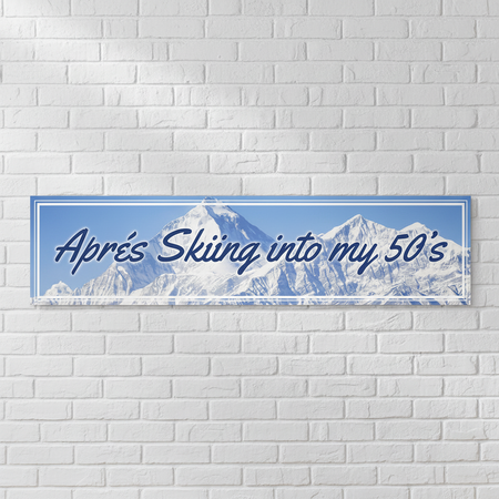 Après Skiing into my 50s Banner on White Brick Wall
