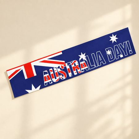 Australia Day paper banner on a plain cream wall