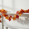 Autumn Leaf Garland on White Mantlepiece