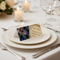 Back of the place name card facing the table with quill and parchment