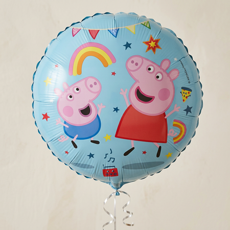 Balloon floating with silver curling ribbon against a neutral background with soft light and shade, close up in square format