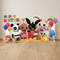 Bing birthday standee shown in proportion on a wooden floor against a neutral wall, in square format
