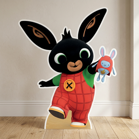 Bing Bunny cardboard cutout on a wooden floor against a neutral wall with soft light and shade, in square format