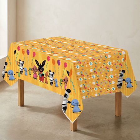 Bing tablecloth with wooden table legs and a neutral background, in square format