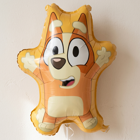 Bingo balloon against a neutral wall with soft light and shade, in square format