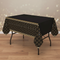 Black and gold Art Deco tablecloth on a party table