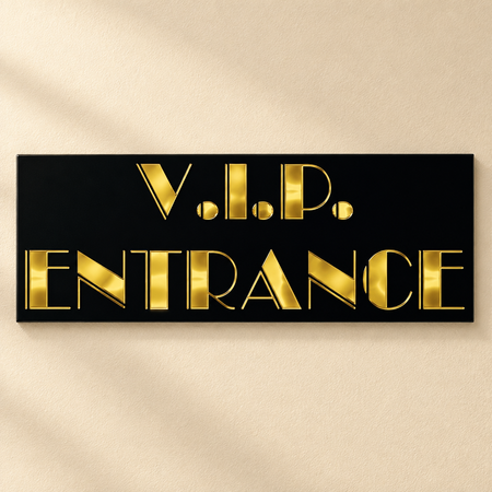 Black and gold entrance sign on a cream wall