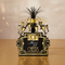 Black and gold Pop Fizz Cheers centrepiece