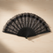 Black Lace Fan Flat Lay Overhead