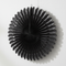 Black Paper Fan on White Textured Wall