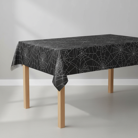 Black Spiderweb Tablecloth on Table Neutral Background