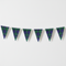 Black Watch tartan bunting on a white wall