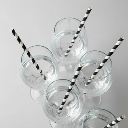 Black White Striped Straws in Gin Glasses Side View