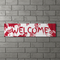 Bloody Welcome Banner on Grey Brick Wall