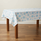 Blue Snowflake Tablecloth - Wood Table Scene