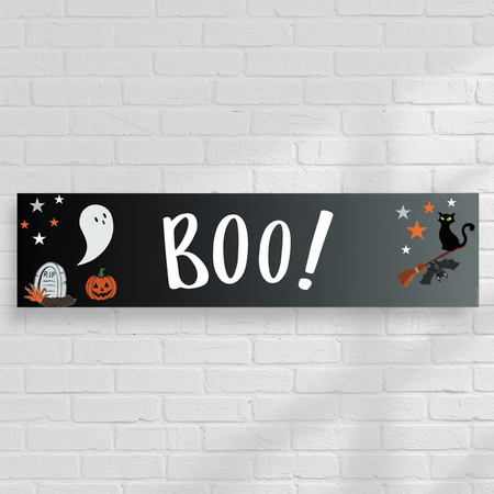 BOO! Halloween Banner on White Brick Wall