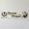 Burns Supper banner on a white brick wall