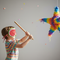 Child Wearing Piñata Blindfold Side Profile