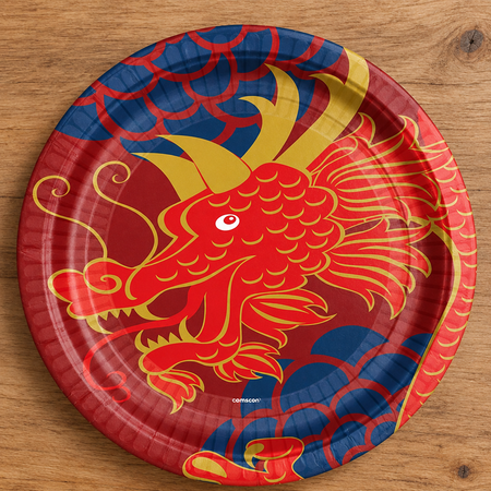 Chinese dragon paper plate from above on a wood table, square format