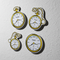 Clock Cutouts on White Textured Wall