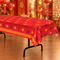 Close-up of half of the red Chinese New Year table cover on a folding table, square format
