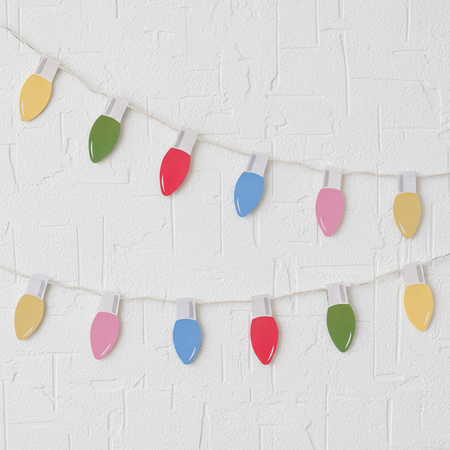 Colourful Lightbulb Garland on White Textured Wall