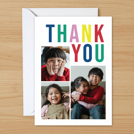 Colourful thank-you card on wood
