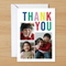 Colourful thank-you card on wood