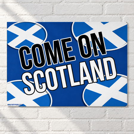 Come On Scotland poster on a white brick wall with soft light and shade, in square format