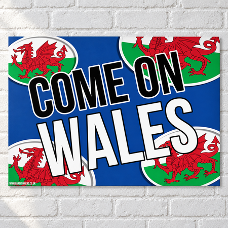 Come On Wales poster on a white brick wall with soft light and shade, in square format