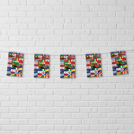 Commonwealth Multi-Flag Bunting on White Brick Wall