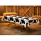 Cow Print Tablecloth on Table with Wild West Party Background