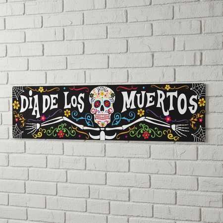 Dia De Los Muertos Banner on White Brick Wall