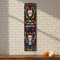 Dia de los Muertos Banner on White Brick Wall