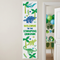 Dinosaur banner centred on a neutral wall beside an open doorway into a dinosaur-themed party, in square format