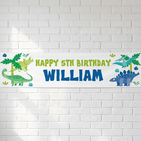 Dinosaur birthday banner on a white brick wall with soft light and shade, in square format