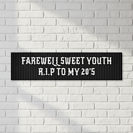 Farewell Sweet Youth Banner on White Brick Wall