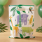 Filled jungle plastic party bag centred on a wooden table with a softly blurred jungle-party background, in square format
