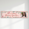 Floral personalised banner on a white wall with soft light and shade, in square format
