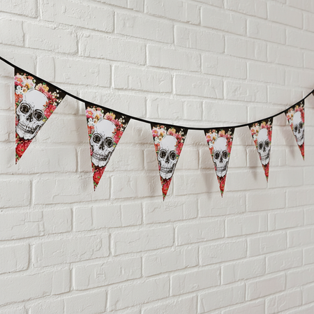 Floral Skull Bunting on White Brick Wall