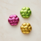 Foil Flower Chocolates Flat Lay on Neutral Surface