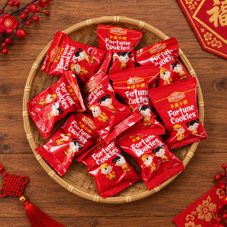 Fortune cookies in a basket on a wooden table