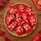 Fortune cookies in a basket on a wooden table