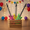 Four Neon Inflatable Rock n Roll Guitars in Basket Indoor Party
