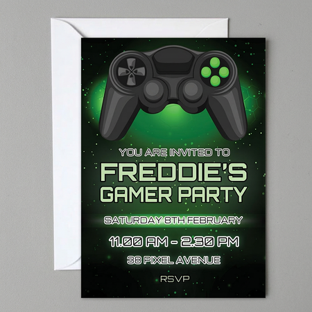 Gamer party invitation and envelope on a grey plastic surface