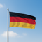 German Flag on Pole with Blue Sky
