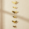 Gold Bat Garland on Cream Textured Wall